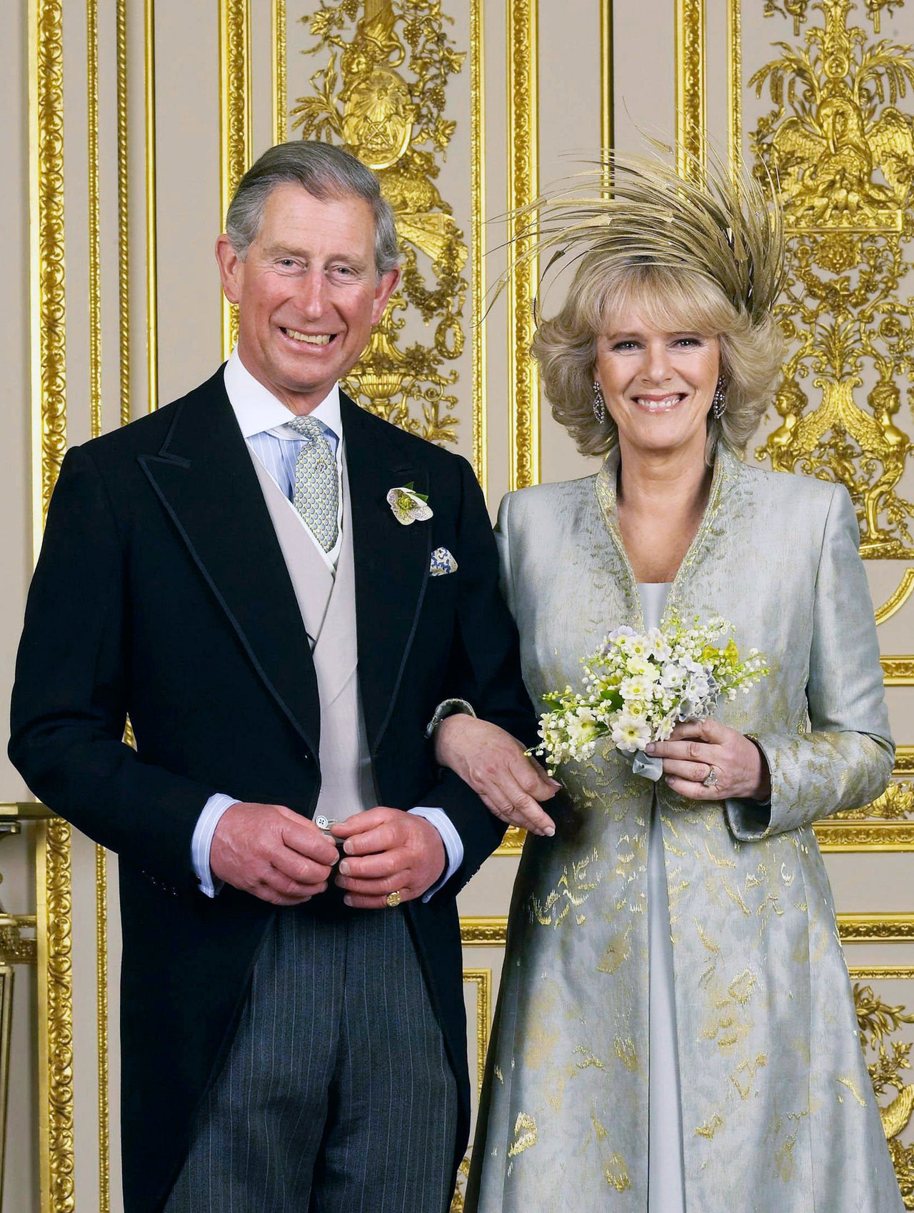 Prince Charles and the Duchess of Cornwall pose for their official wedding photo in the White Drawing Room at Windsor Castle 