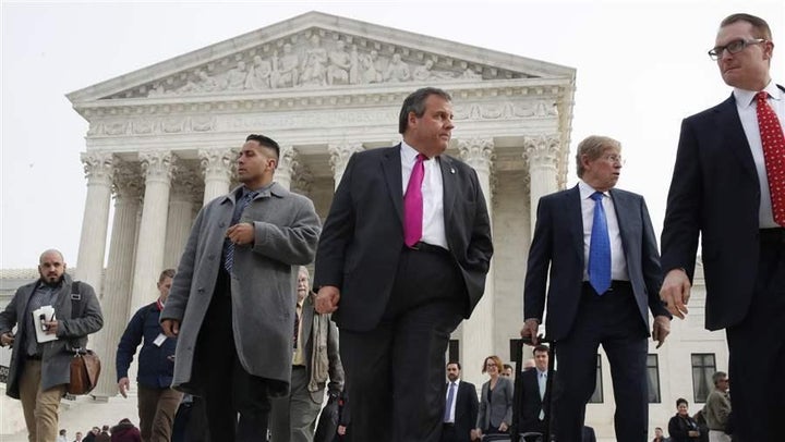 Then-Gov. Chris Christie of New Jersey leaves the U.S. Supreme Court after oral arguments in December on a case that could le