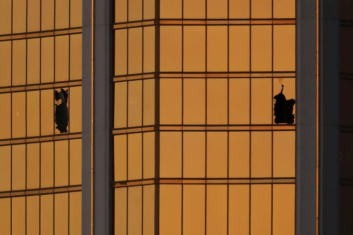 Broken windows are seen on the 32nd floor of the Mandalay Bay hotel in Las Vegas, where Stephen Paddock fired on a crowd below in early October. At least 15 states and a number of local jurisdictions have taken taken up proposals to ban bump stocks since the shooting.