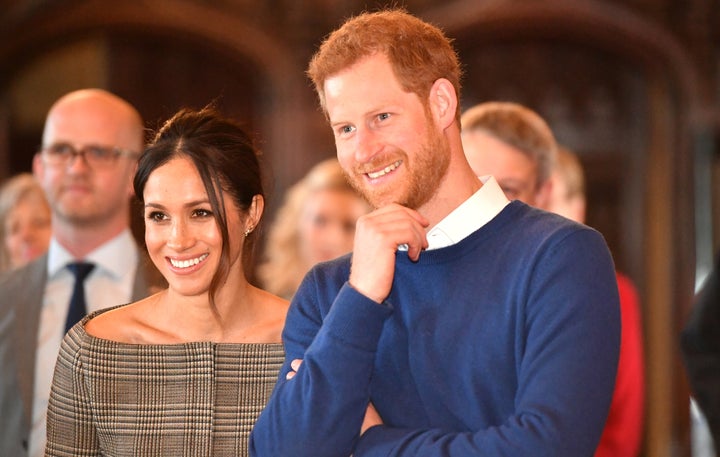 Prince Harry and Meghan Markle watch a performance during a visit to Cardiff Castle on Jan. 18, 2018.