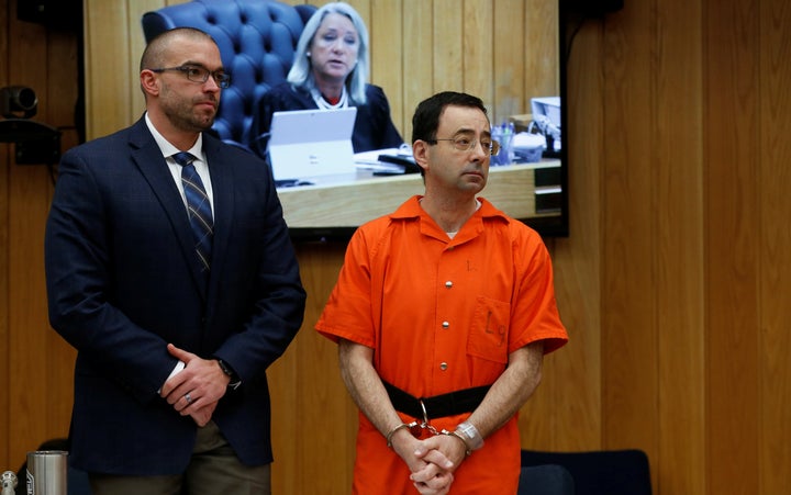 Larry Nassar stands with attorney Matt Newburg during his second sentencing hearing on Jan. 31.