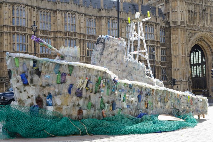 A boat made of plastic bottles, is seen outside the Parliament, in London on September 13, 2017. The boat has been built by the members of 'Surfers Against Sewage' to show the increasing amount of plastic in the seas.