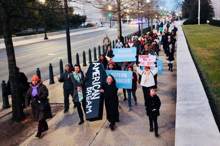 Protesters held a funeral for the "American Dream" on Tuesday in Washington, D.C., after President Donald Trump unveiled his