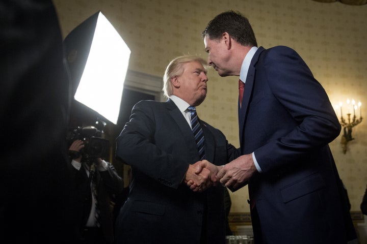 President Donald Trump shakes hands with James Comey at the White House on Jan. 22, 2017.