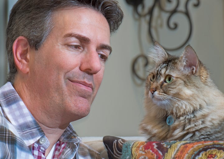 Humane Society CEO Wayne Pacelle at home with his cat Zoe in Chevy Chase, Maryland, on August 31, 2016.