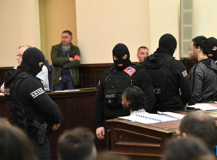 Salah Abdeslam, pixilated right, appears in court for the first day of his trial in Brussels 