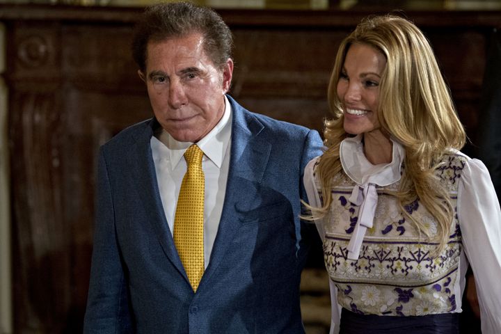 Wynn and his wife, Andrea Hissom, arrive at a White House event in July 2017. 