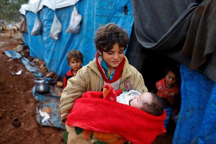 Syrian refugees in the Kelbit refugee camp, near the Syrian-Turkish border