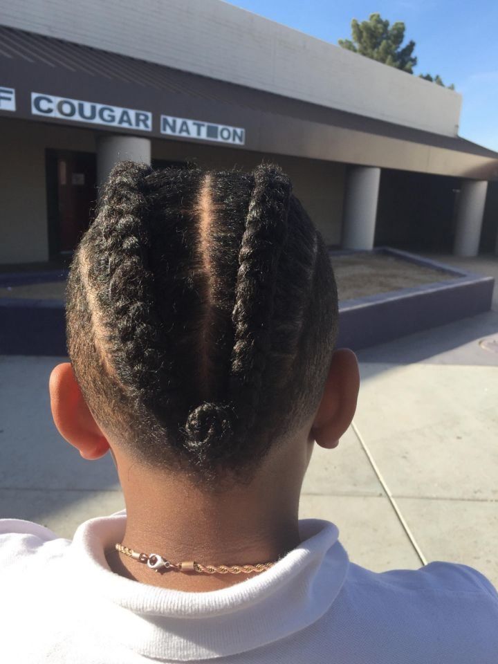 A mother pulled her son out of school when he violated the dress code for his hairstyle.