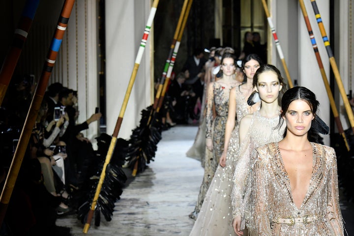 Models walk the runway at the Zuhair Murad couture show in Paris on Jan. 24. Murad was accused of cultural appropriation for this collection, which was promoted with the hashtag #IndianSummer.