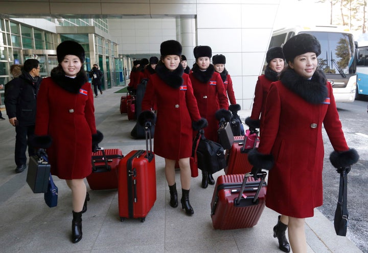 North Korean cheering squads arrive at the Korean-transit office near the Demilitarized Zone ahead of the Pyeongchang 2018 Winter Olympic Games in Paju on February 7, 2018. 