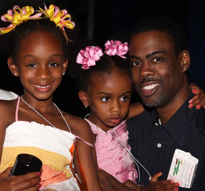 Chris Rock with daughters Lola and Zahra during Lola's sixth birthday celebration in 2008.