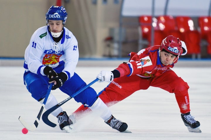 Finnish and Russian hockey players compete in the 2018 Bandy World Championship semi-final match in Khabarovsk, Russia.