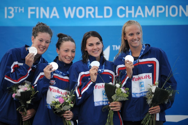 Kukors celebrating with teammates Dana Vollmer, Lacey Nymeyer and Allison Schmitt after winning their silver medal on the women's 4x200-meter freestyle final on July 30, 2009, at the FINA World Swimming Championships in Rome.