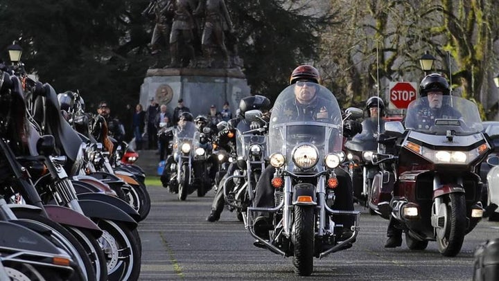 Motorcycle riders arrive in Olympia, Washington, last month for a rally sponsored by ABATE, one of the motorcycle groups that support legalizing lane-splitting, which would allow motorcyclists to share or split the lane with other motorists.