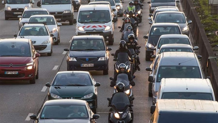 <p>Motorcyclists split a lane in France in 2016. In the United States, only California allows lane-splitting.</p>