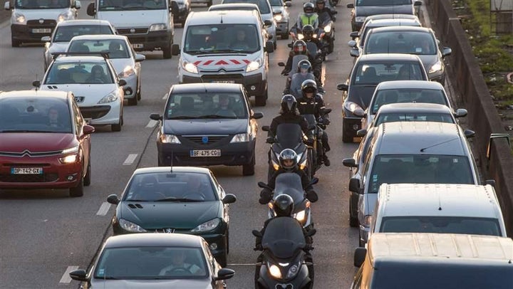 Motorcyclists split a lane in France in 2016. In the United States, only California allows lane-splitting.