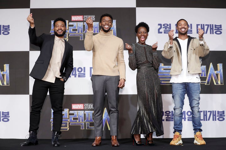 From left, "Black Panther" director Ryan Coogler flashes a finger heart alongside actors Chadwick Boseman, Lupita Nyong'o and Michael B. Jordan at the Seoul premiere of their movie earlier this month.