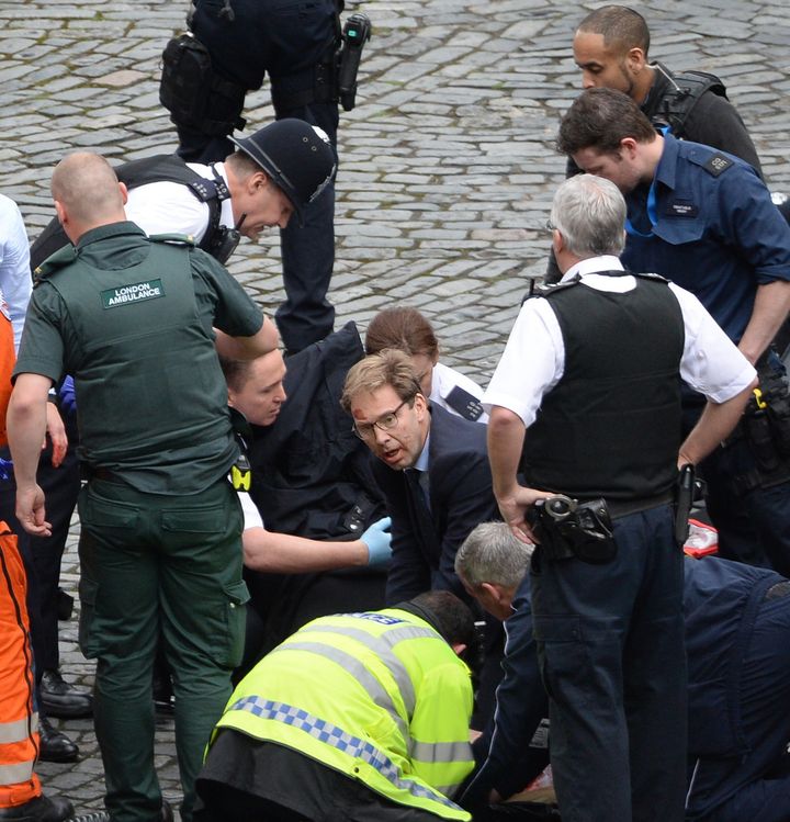 Tobias Ellwood (centre, wearing glasses) was caught up in the Westminster terror attack and tried to save fatally injured police officer PC Keith Palmer