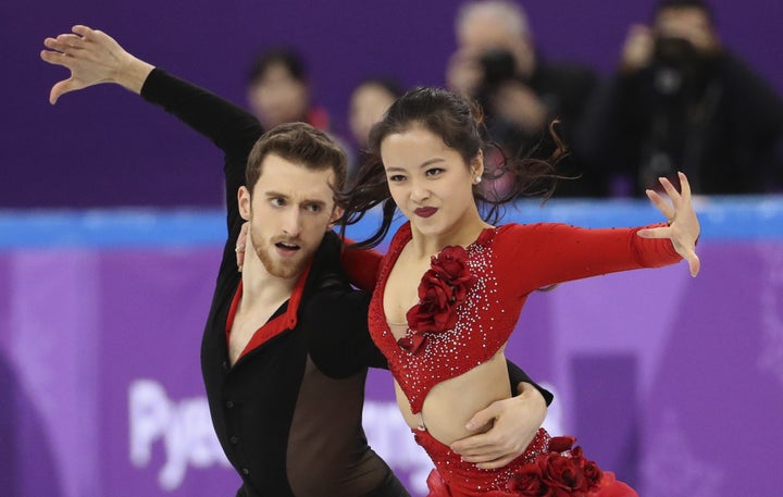 Yura Min and Alexander Gamelin of South Korea compete at the Winter Olympics on Feb. 11, 2018.