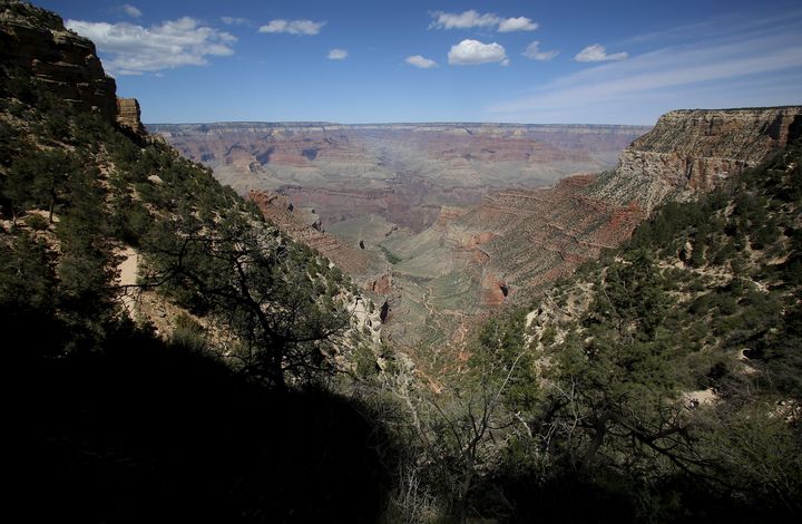 The three Britons who died when a helicopter crashed in the Grand Canyon on Saturday have been named