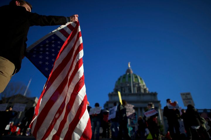 Protesters demonstrate outside the Pennsylvania Capitol in Harrisburg in December 2016.