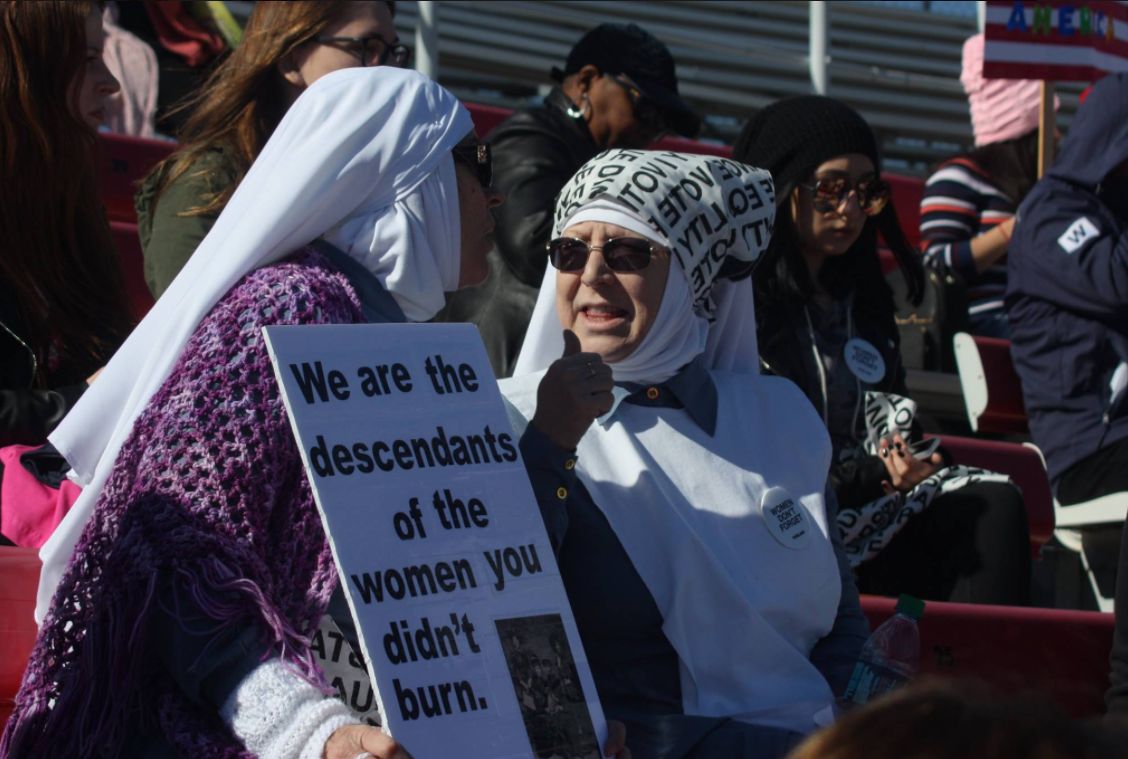 The sisters attend a 2018 women's march in California. 