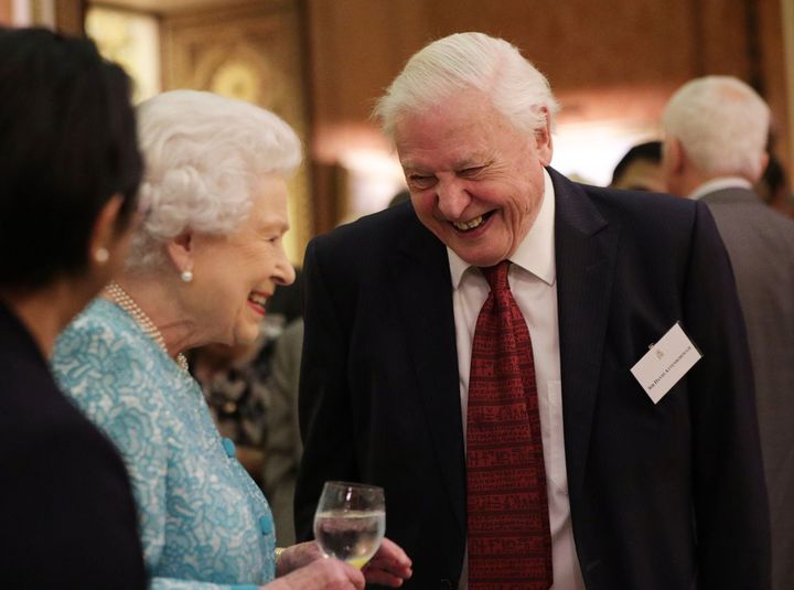 Queen Elizabeth II with Sir David Attenborough during an event at Buckingham Palace, London, to showcase forestry projects that have been dedicated to the new conservation initiative - The Queen's Commonwealth Canopy (QCC).