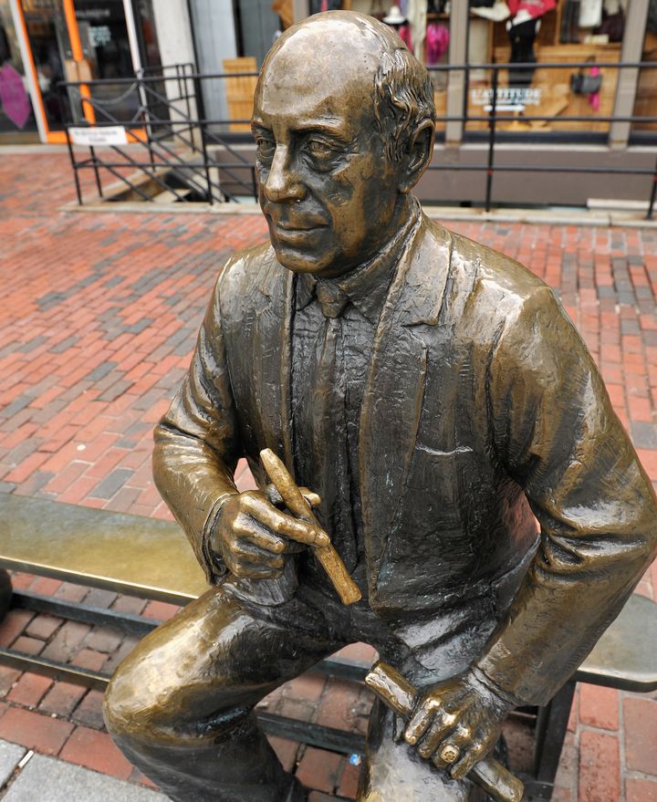 The Boston PD's Tweet honored former Boston Celtics coach and president Red Auerbach, whose statue is seen in the city's Faneuil Hall Market.