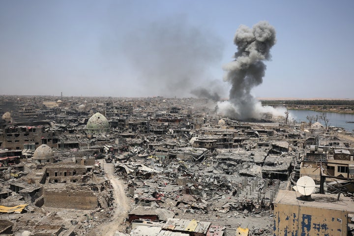 Smoke billows after an airstrike by U.S.-led international coalition forces targeting the so-called Islamic S