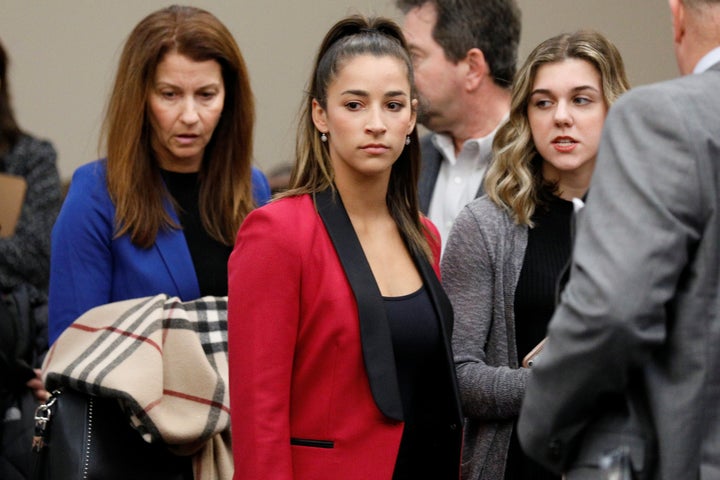 Olympic gold medalist Aly Raisman appears before speaking at the sentencing hearing for Larry Nassar, a former team USA Gymnastics doctor who pleaded guilty in November to sexual assault charges. Nassar has been sentenced to up to 175 years in prison.