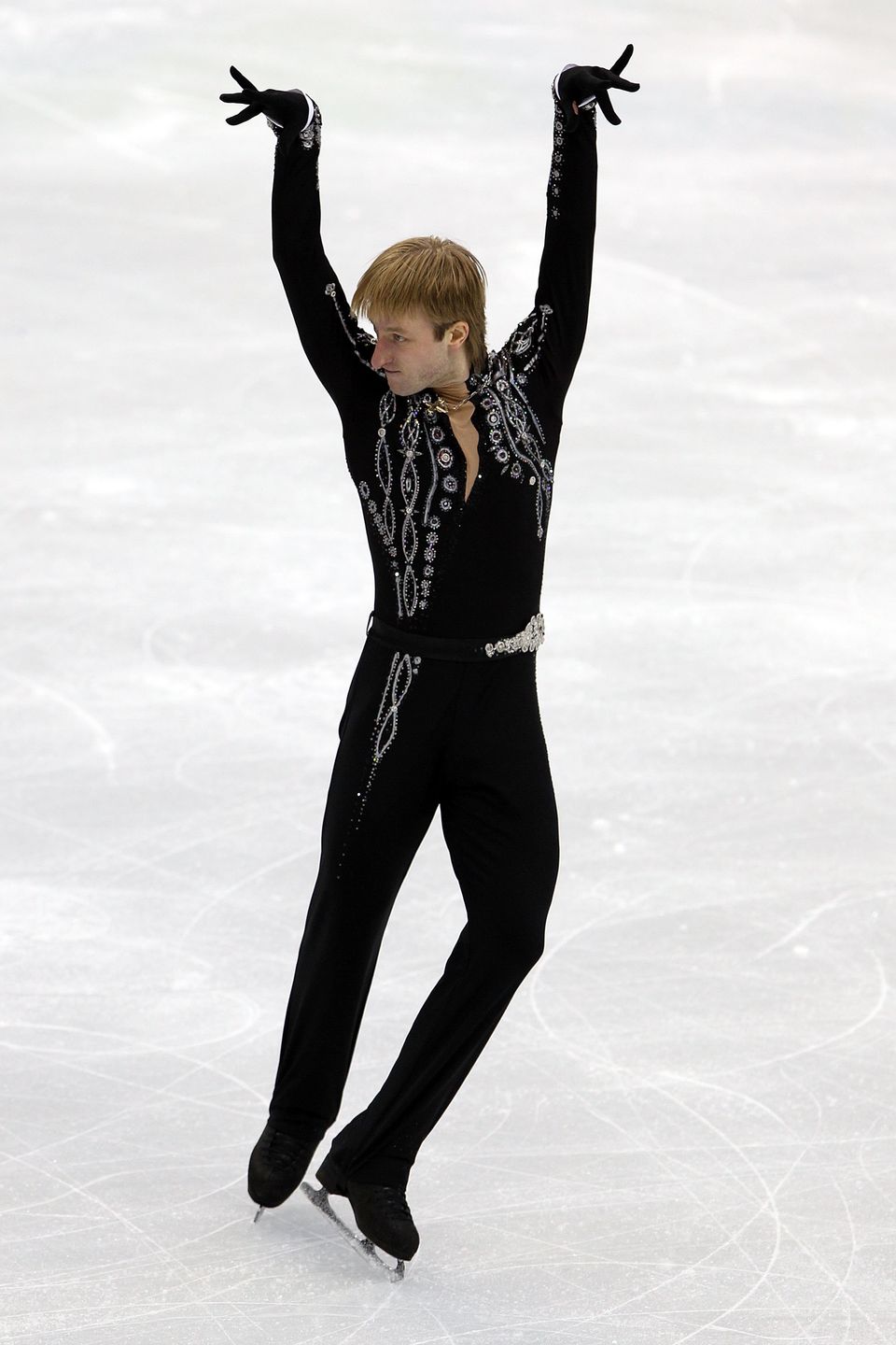 The Epic Evolution Of Men's Figure Skating Costumes Through The Years