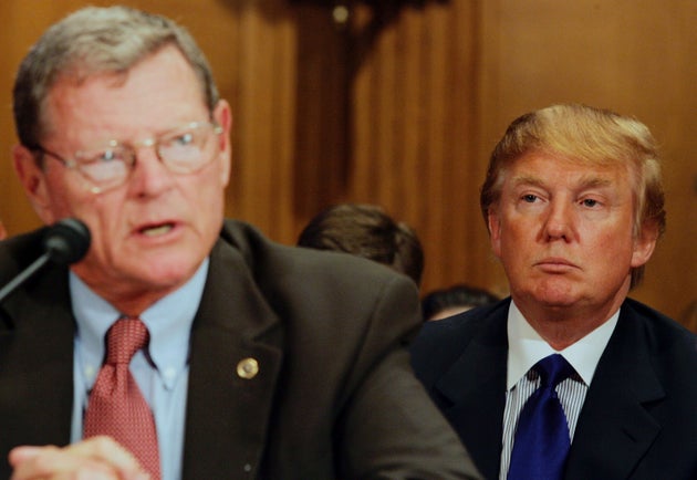 In a photo from July 2005,&nbsp;Donald Trump (R), then president of the Trump Organization, listens as&nbsp;Sen.&nbsp;James...