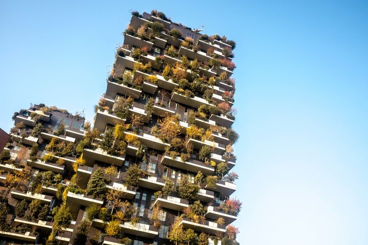 The Bosco Verticale buildings in autumn in Porta Nuova complex. The complex is an 11-story office building. Its height is 111 meters and 76 meters that will gather more than 900 trees of 96,000 sq ft. terraces.