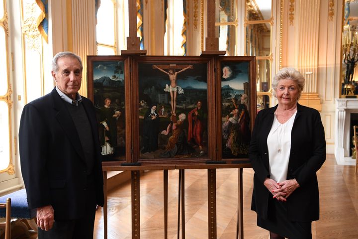 Henrietta Schubert and Christopher Bromberg are the grandchildren of Henry and Hertha Bromberg, a German-Jewish couple who fled Germany before World War II. France officially returned the Triptych of the Crucifixion painting by Joachim Patenier to the Brombergs' descendants this week.
