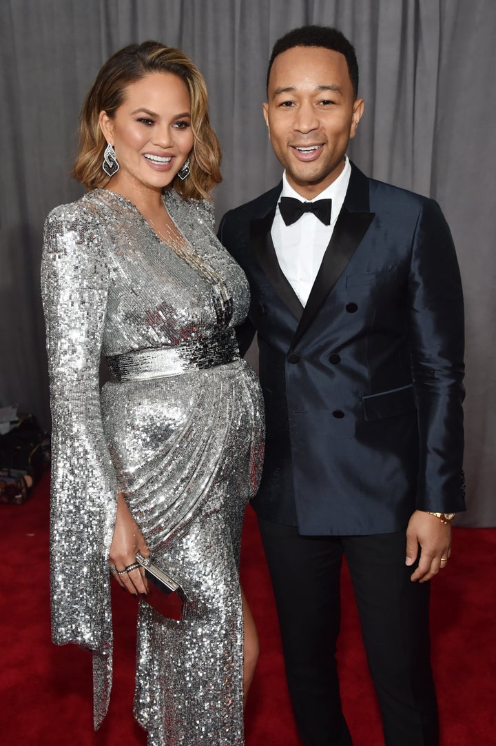 Chrissy Teigen and John Legend arrive at the 2018 Grammy Awards. 