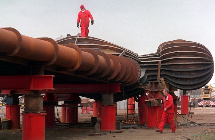 Workmen putting the finishing touches to the steel giant 