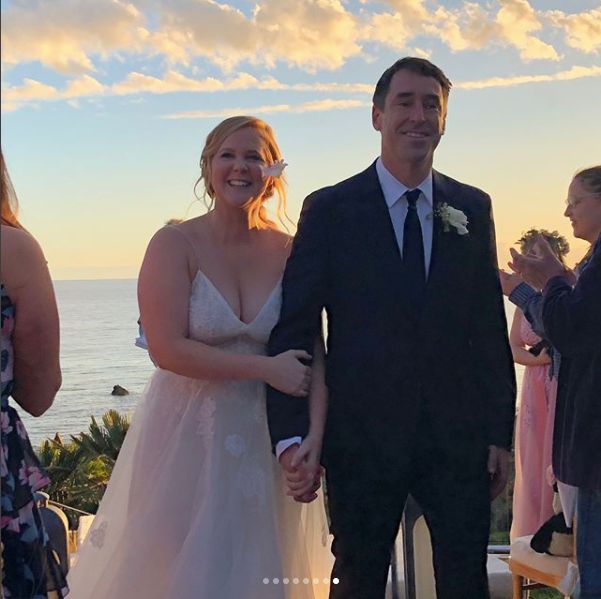 Amy Schumer and her new husband, Chris Fisher.