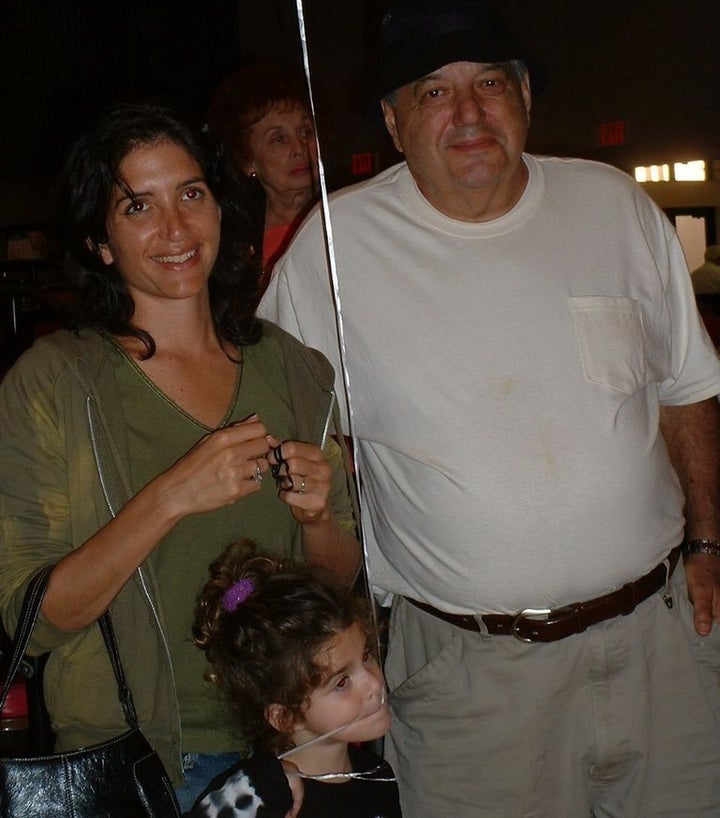 A family photograph of Merri Novell with her daughter Carly and father Charles Cohen.