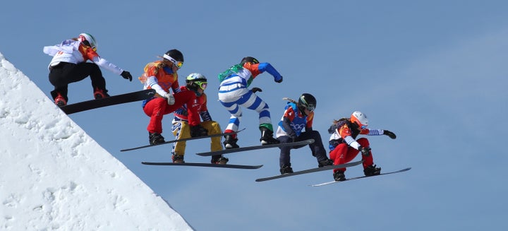 The snowboard cross final goes airborne at the Winter Olympics on Friday.