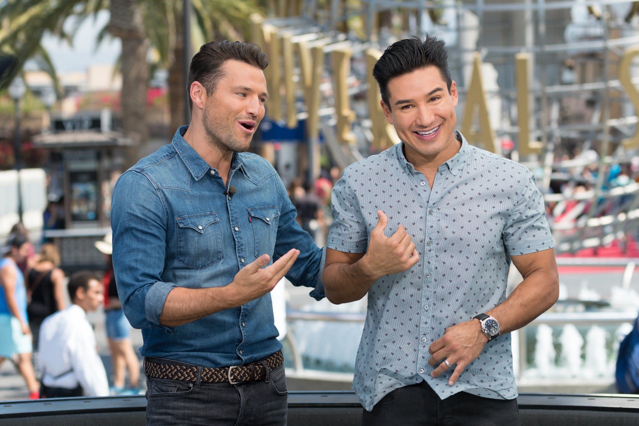 Mark Wright with 'Extra' co-host Mario Lopez