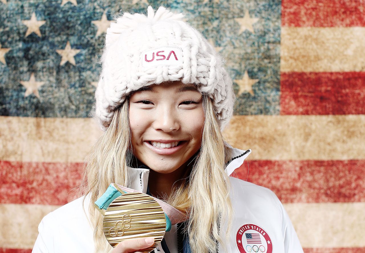 Chloe Kim, 17, holds her gold medal in the women's snowboarding halfpipe event at the Pyeongchang 2018 Winter Olympics.