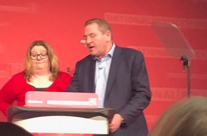 NEC chair Andy Kerry takes over the lectern from a bemused Katrina Murray