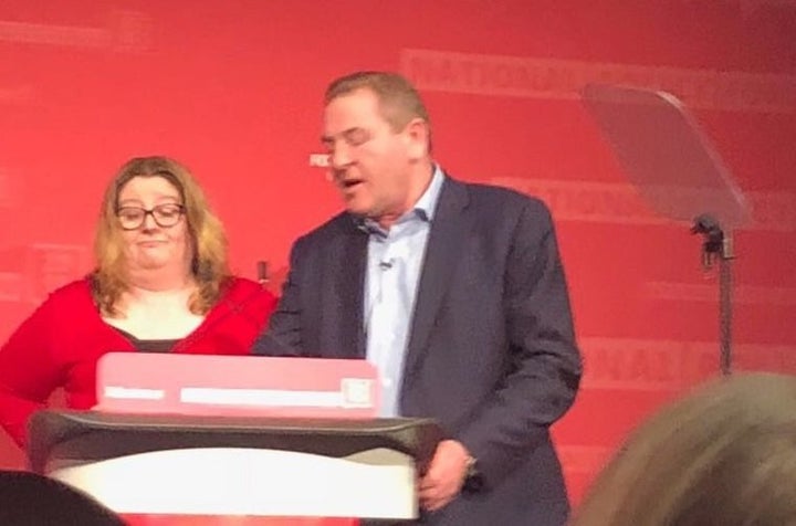 NEC chair Andy Kerr takes the lectern from Katrina Murray