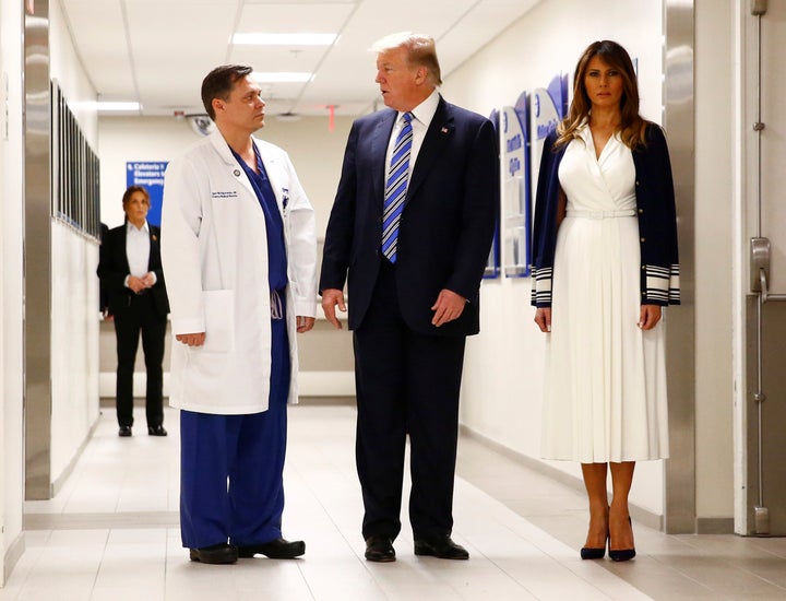 Donald and Melania Trump talk to Dr. Igor Nichiporenko a trauma surgeon at Broward Health North Hospital in the wake of the shooting at Marjory Stoneman Douglas High School that killed 17 people. Then it was off to the Mar-a-Lago disco party.