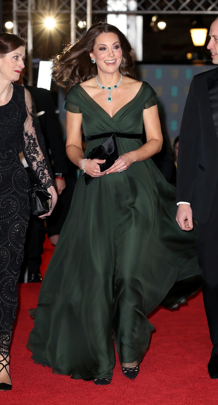 The Duchess of Cambridge turns up in green — with a black belt — at the BAFTA awards.