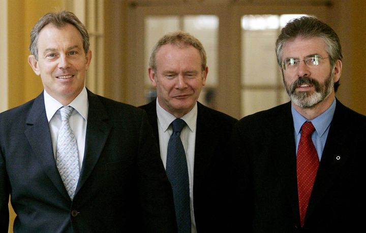 Britain's Prime Minister Tony Blair (L) walks inside 10 Downing Street, with the leader of Northern Ireland's Sinn Fein party Gerry Adams (R) and Sinn Fein Chief Negotiator Martin McGuinness (C) in 1998. 