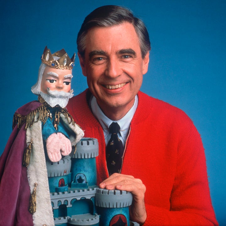 Fred Rogers with King Friday, one of the puppet characters from his show.