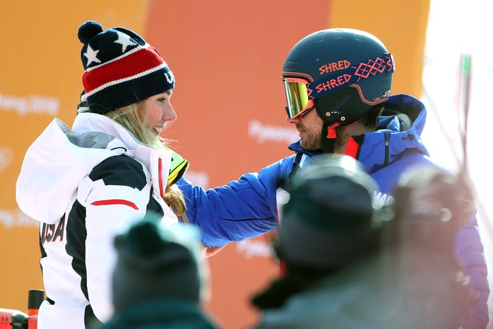Mikaela Shiffrin is congratulated by boyfriend and French World Cup skier Mathieu Faivre after winning the gold medal in the