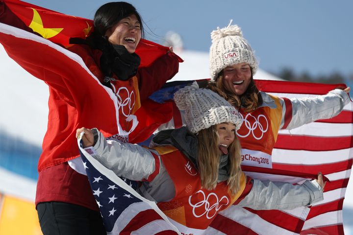 Silver medalist Jiayu Liu of China, gold medalist Chloe Kim of the United States, center, and bronze medalist Arielle Gold of the U.S. at the victory ceremony for the women's snowboard halfpipe final on Feb. 13 in Pyeongchang, South Korea. Winning gold didn't spare Kim from sexist comments.